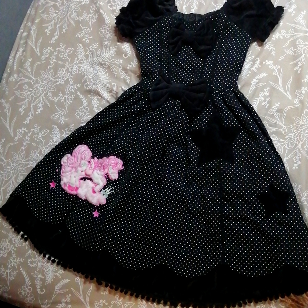 Corset style polka dot dress with pony appliqué and pompoms